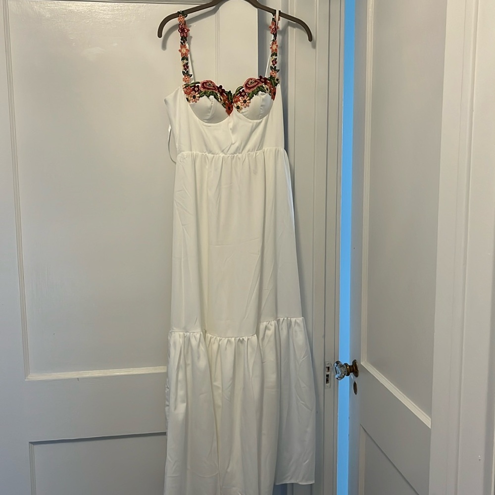 White maxi dress with flower detail